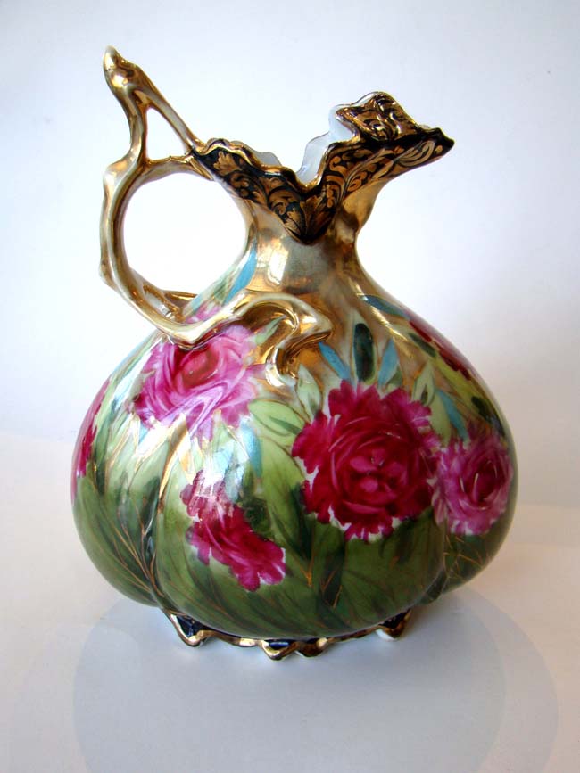 A beautiful hand painted ewer by Nippon circa 1890